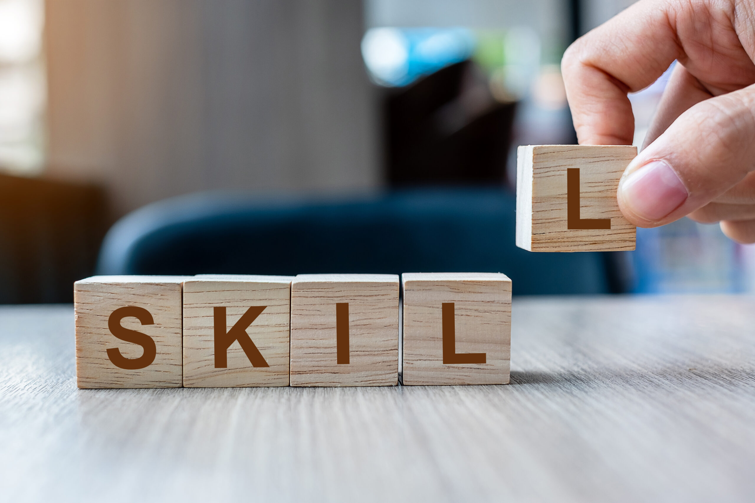 Association Leadership Skills - Hand holding wooden blocks